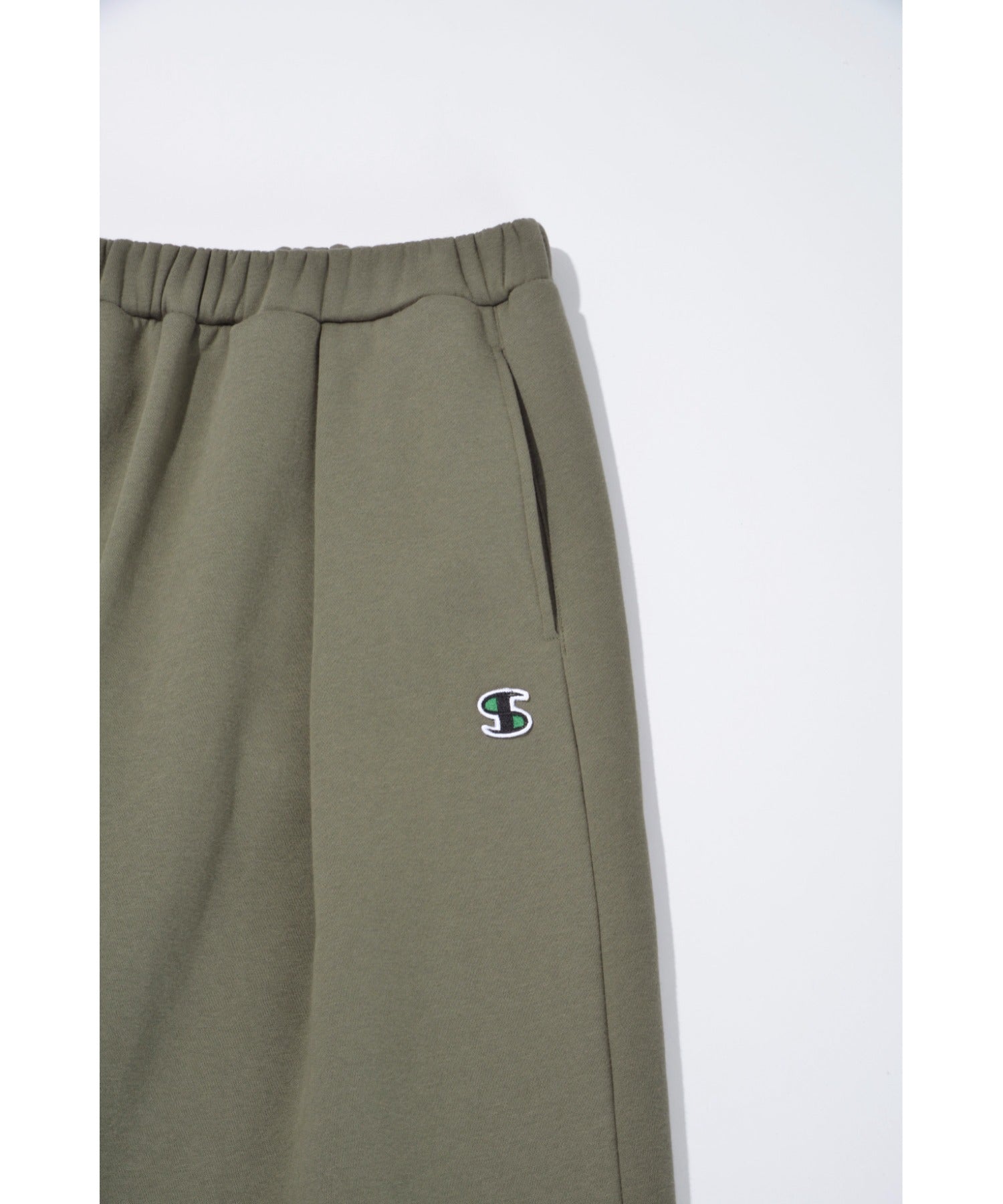 Wide tuck sweat trousers - almond green