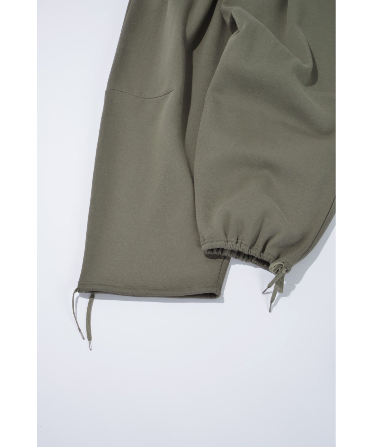 Wide tuck sweat trousers - almond green