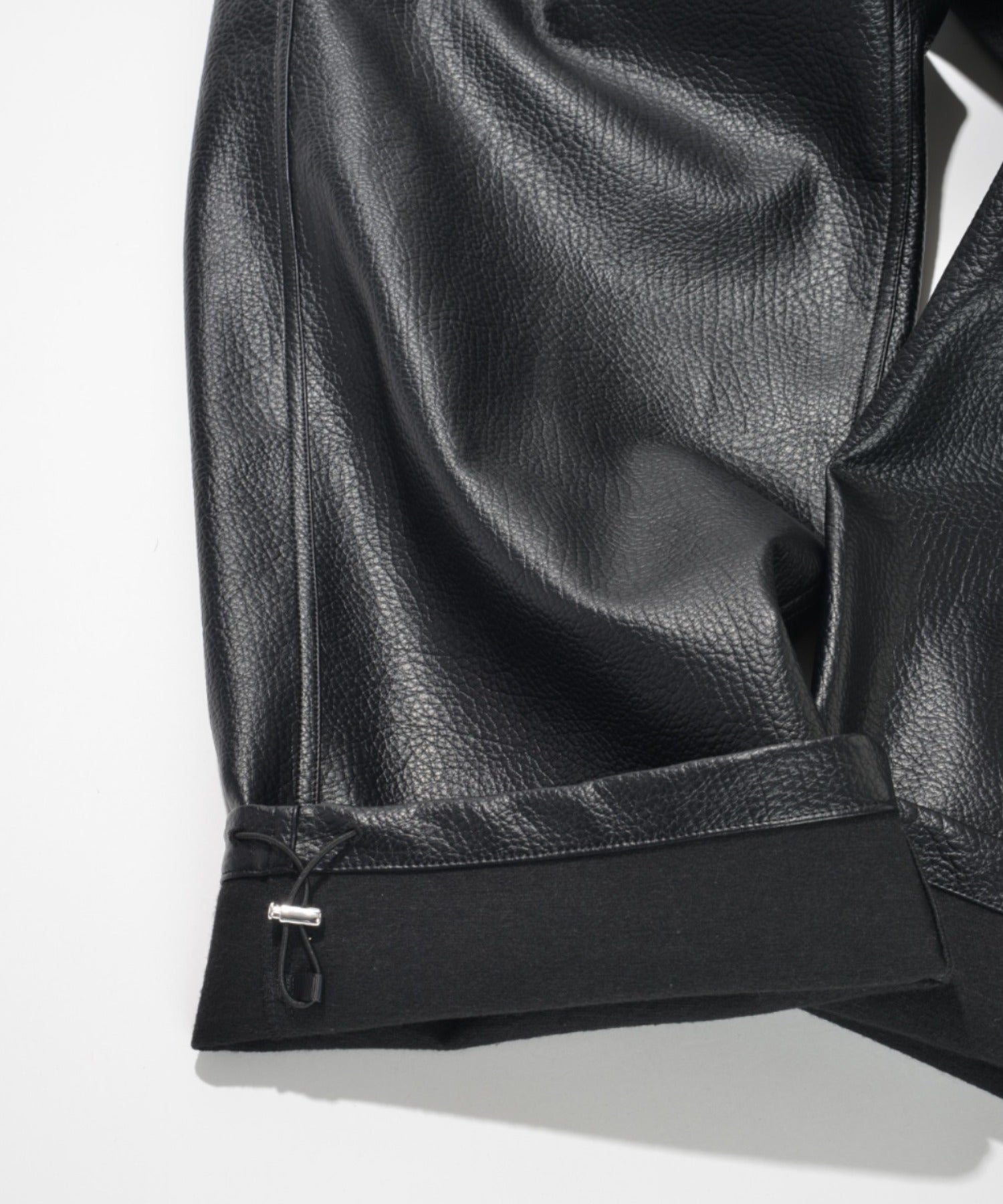 Shrink faux leather side-tuck wide trousers - faux leather black