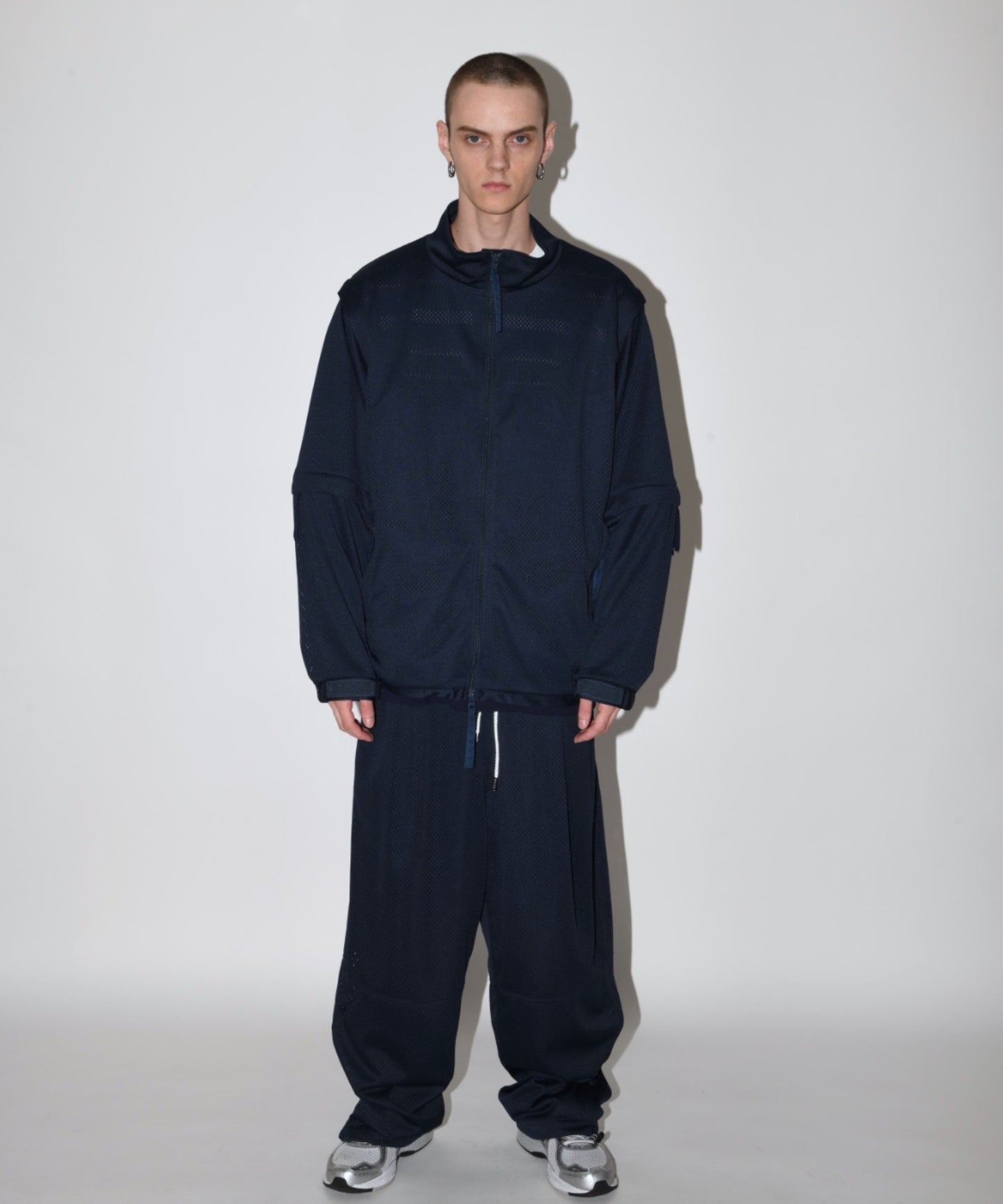 Technical mesh over trousers - black