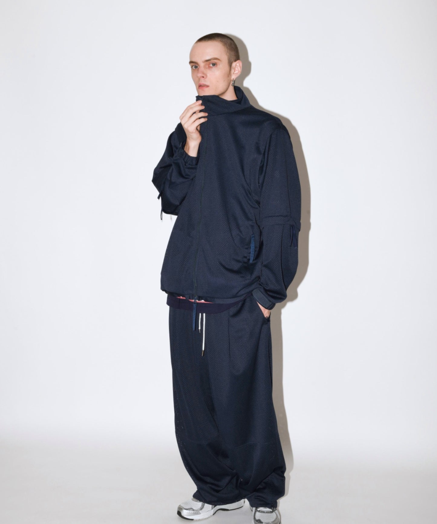 Technical mesh over trousers - black