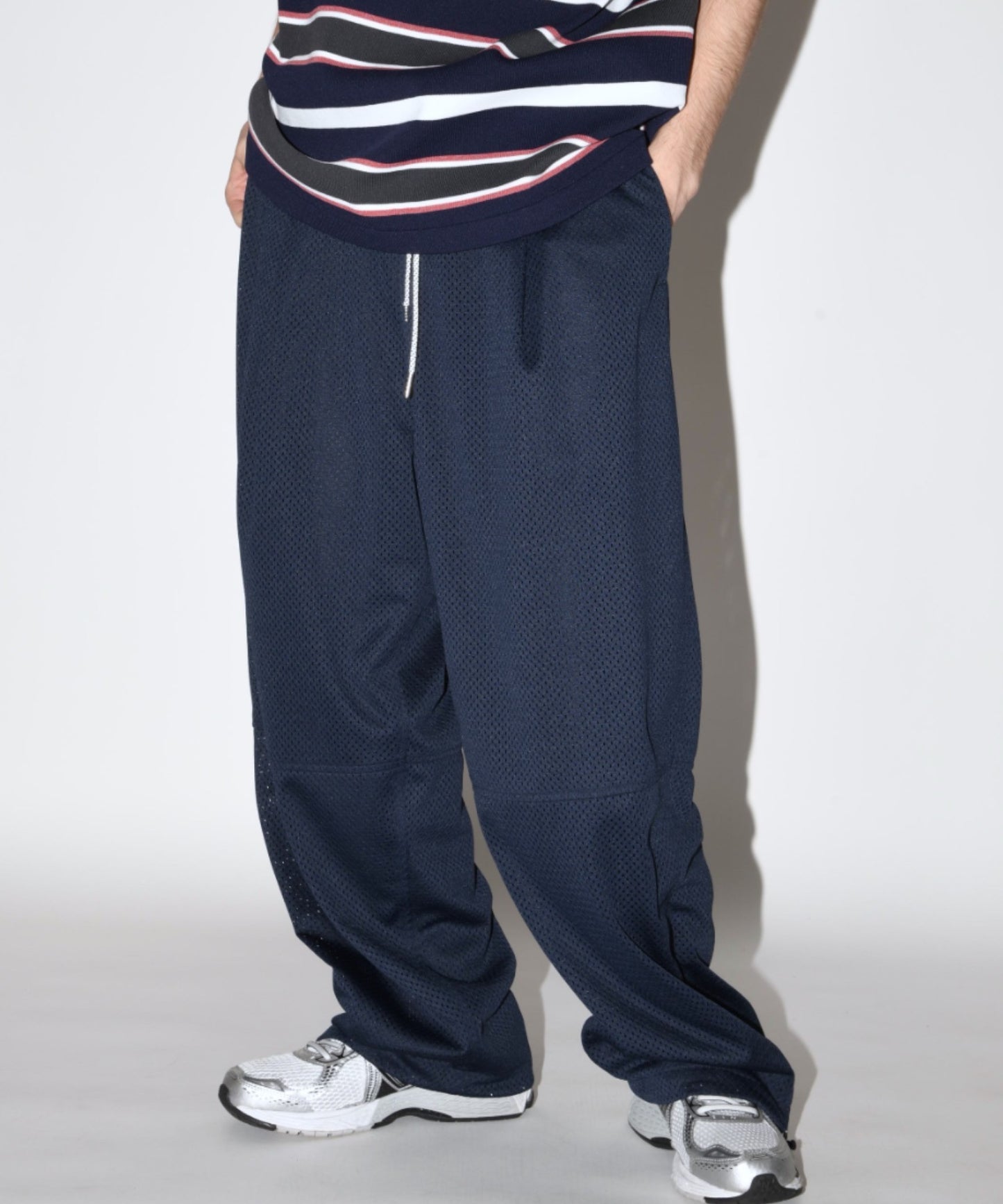 Technical mesh over trousers - black