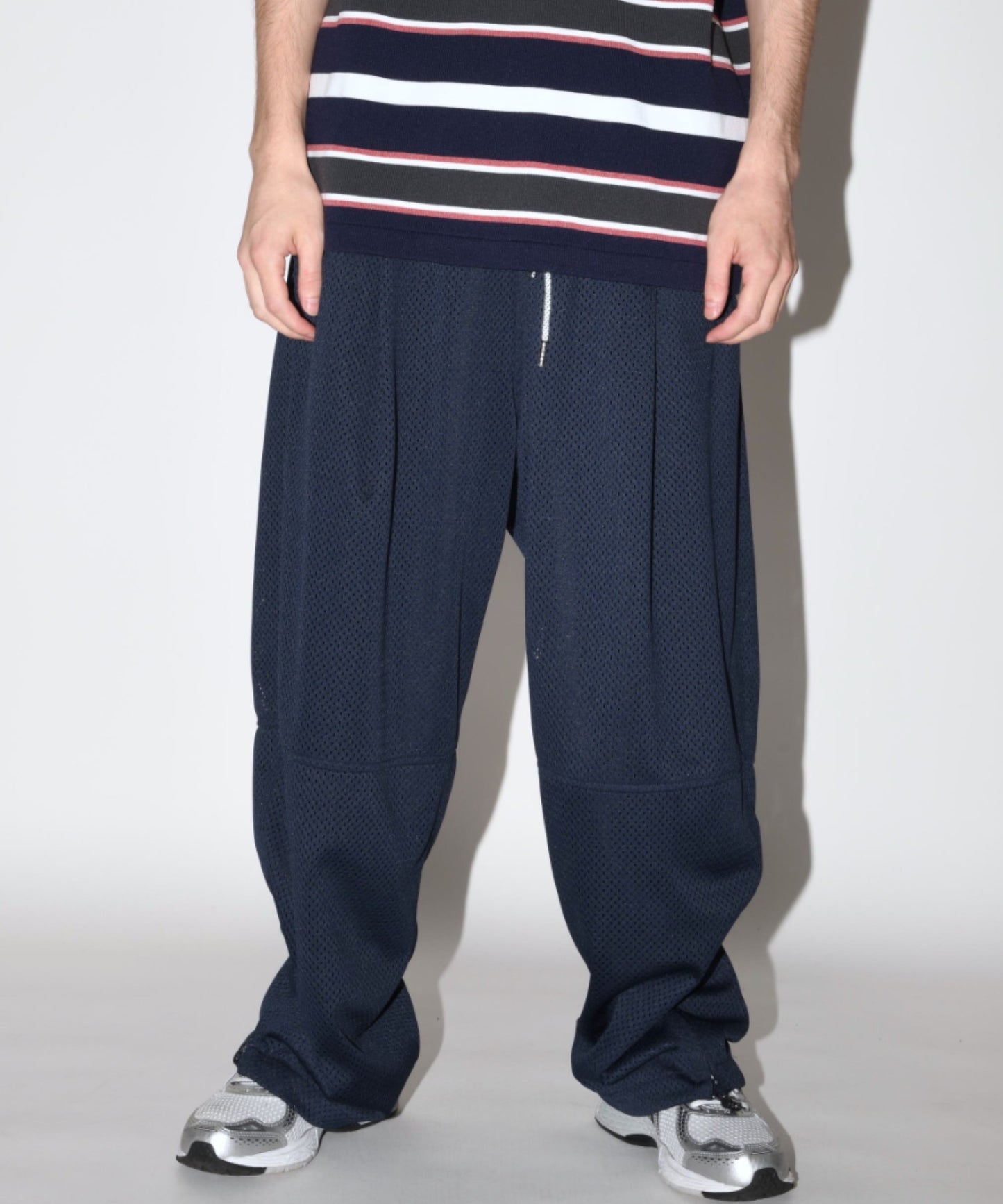 Technical mesh over trousers - black