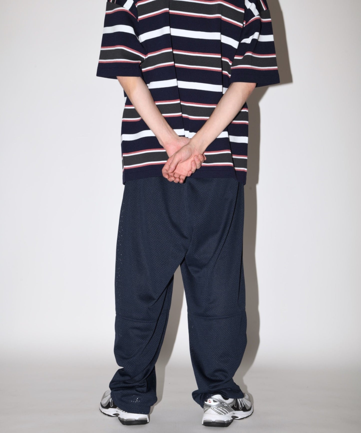 Technical mesh over trousers - black