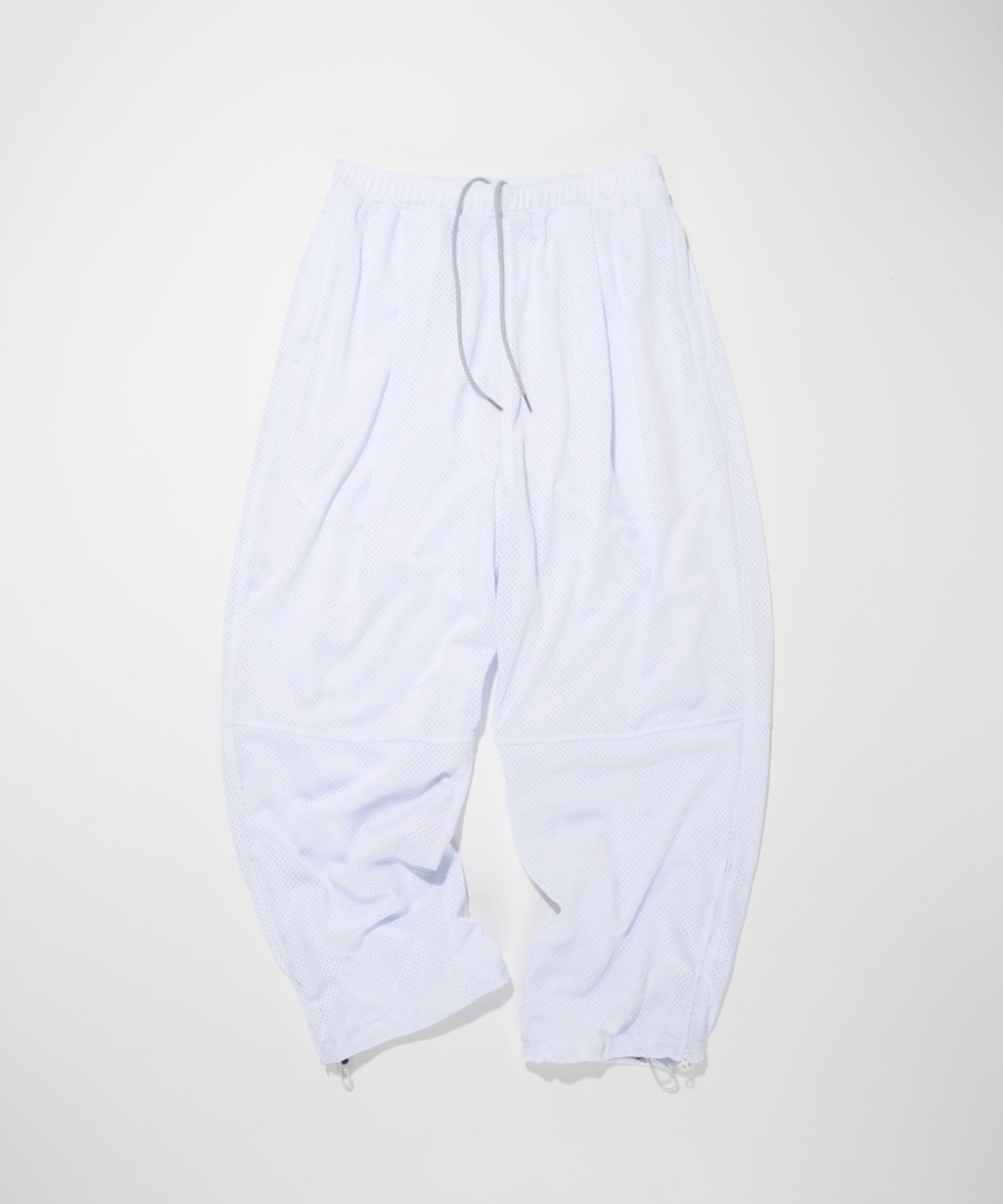 Technical mesh over trousers - white