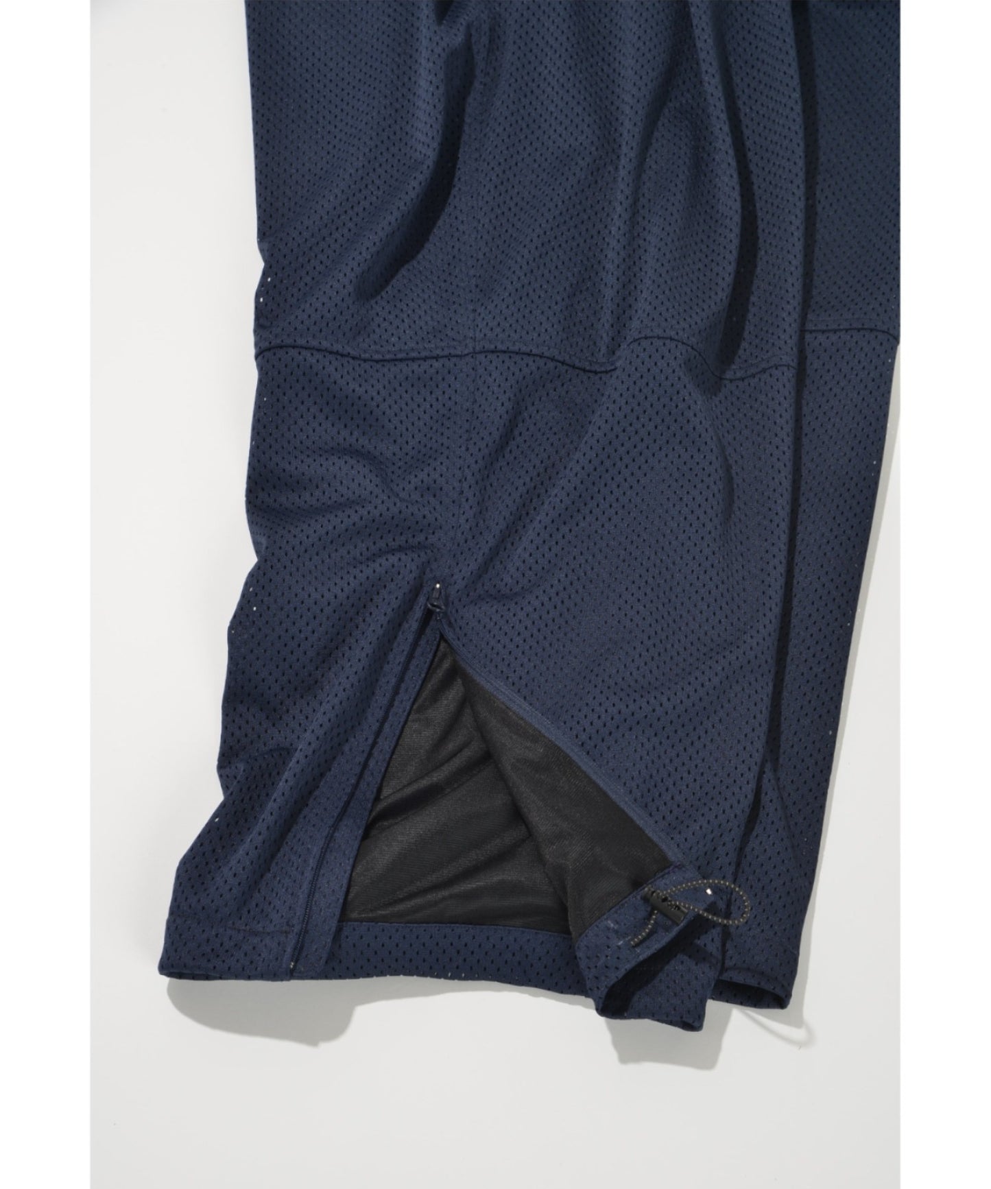 Technical mesh over trousers - black